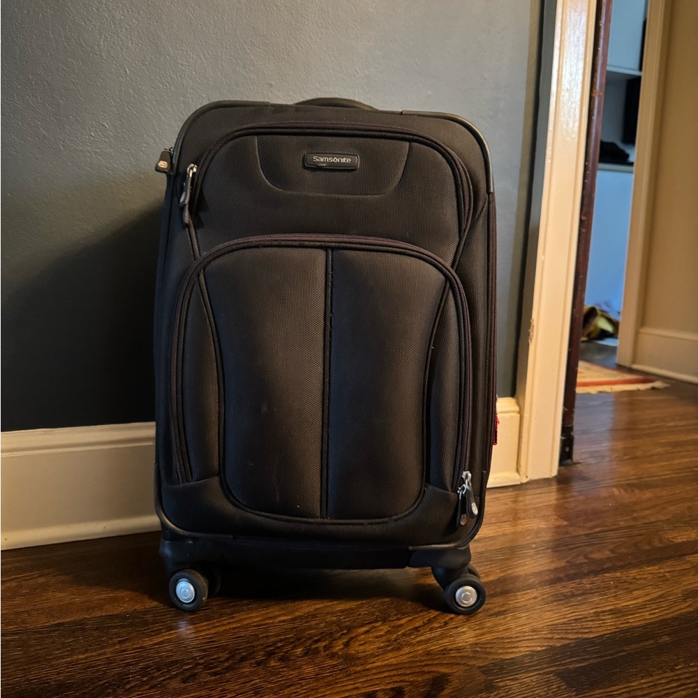 Samsonite Black Rolling Luggage with Telescoping Handle